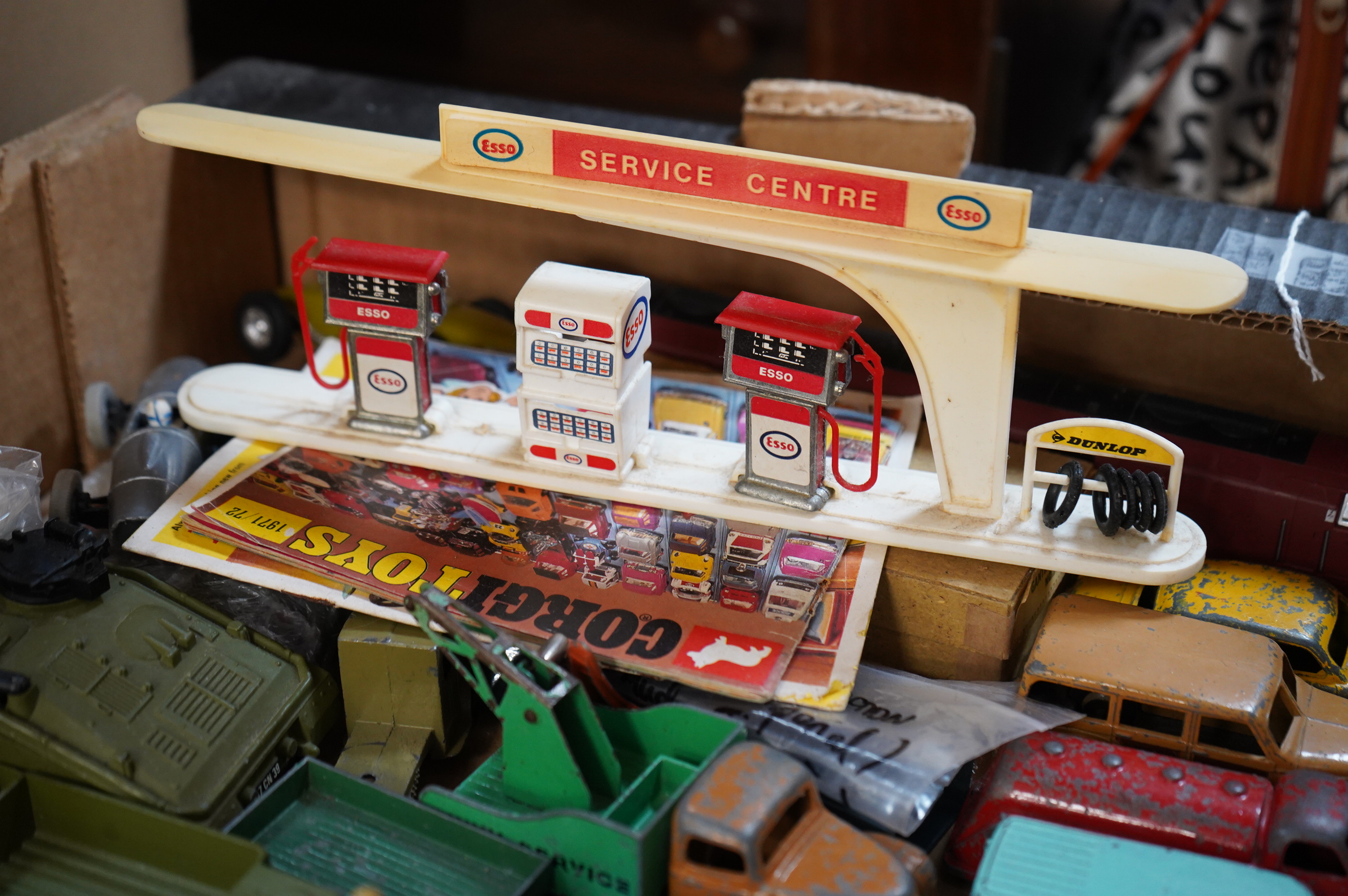 A collection diecast vehicles, lead figures, tinplate, etc. by Dinky Toys, Corgi Toys, Matchbox Series, etc. including; twenty 1950s/60s Dinky Toys, twelve Corgi Toys, two Matchbox Series Collectors Cases (41), both with